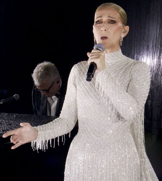 Celine Dion excepțională la ceremonia de deschidere a JO Prima performanță după patru ani. Inima mea este cu voi
